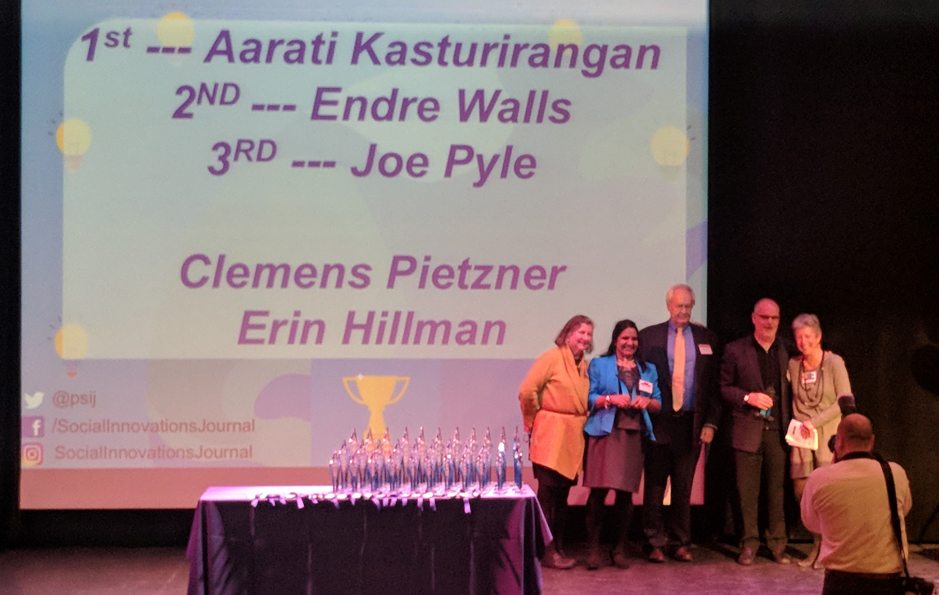 Aarati Kasturirangan poses with other honorees at social innovation awards ceremony